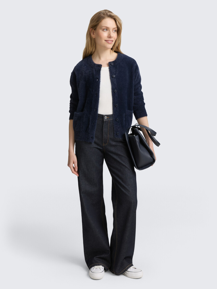 gilet en fil de plumes avec patte de boutonnage