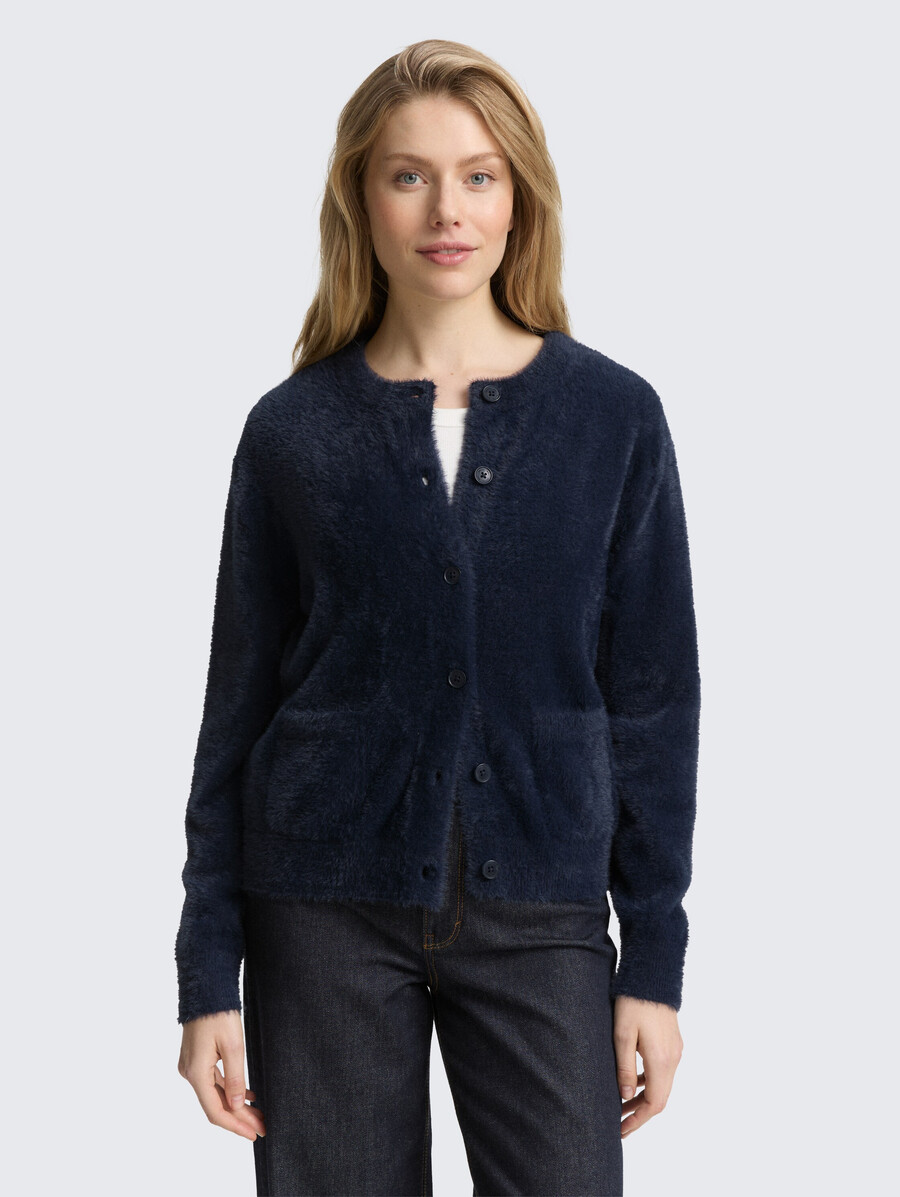 gilet en fil de plumes avec patte de boutonnage