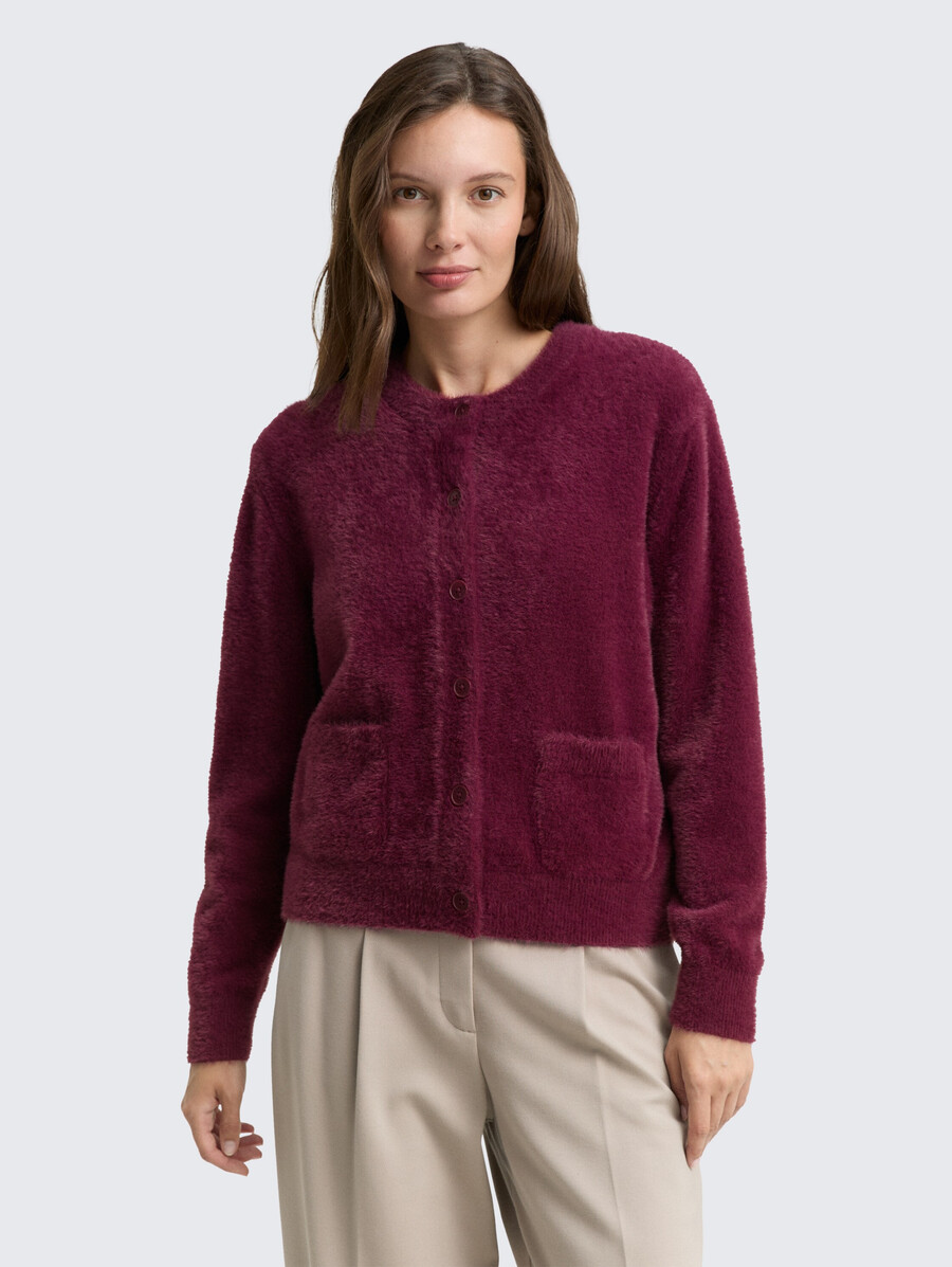 gilet en fil de plumes avec patte de boutonnage