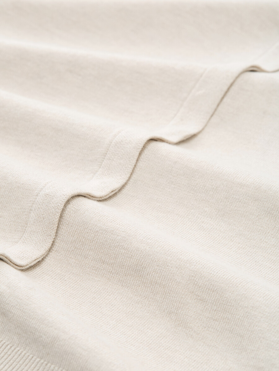 gilet à patte de boutonnage dissimulée