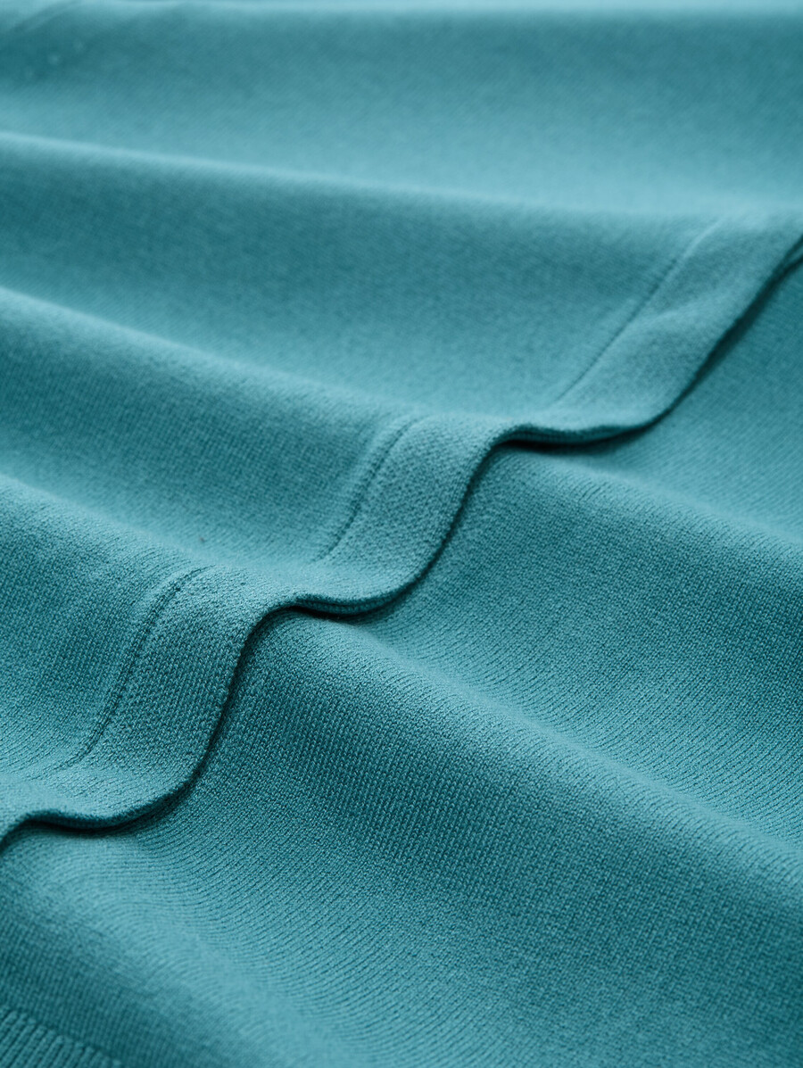 gilet à patte de boutonnage dissimulée