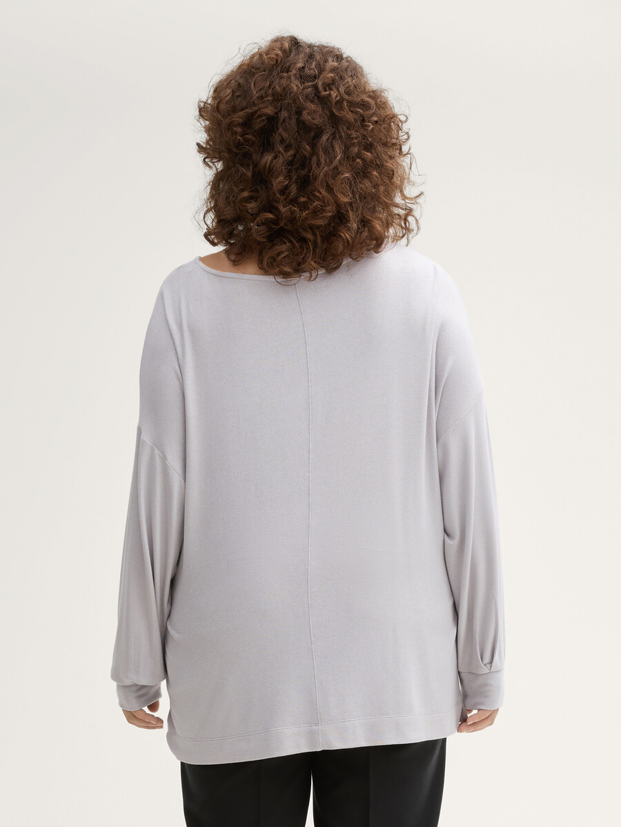 chemise ample à manches longues grande taille avec un effet pailleté subtil.