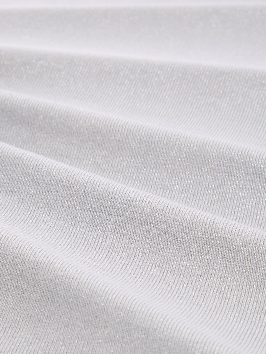 chemise ample à manches longues grande taille avec un effet pailleté subtil.