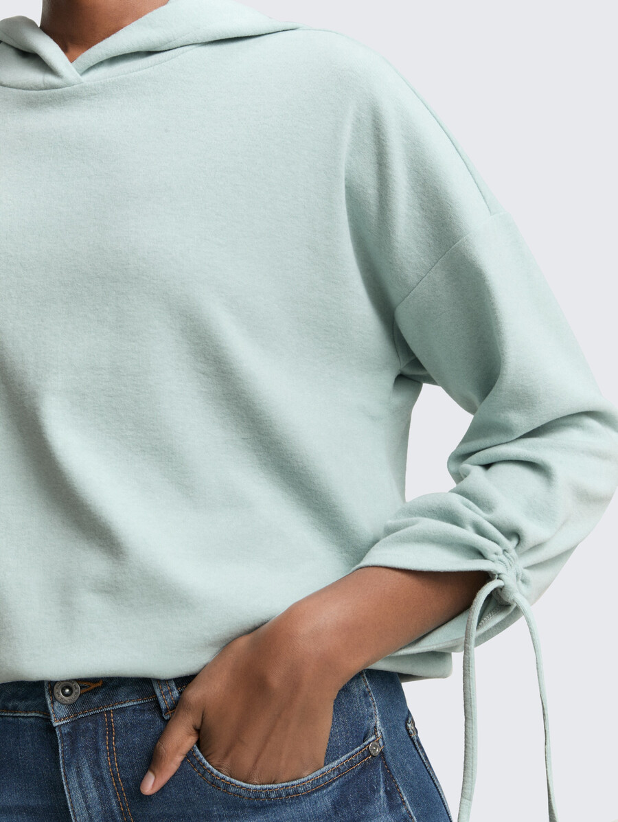 chemise ample à manches longues avec capuche