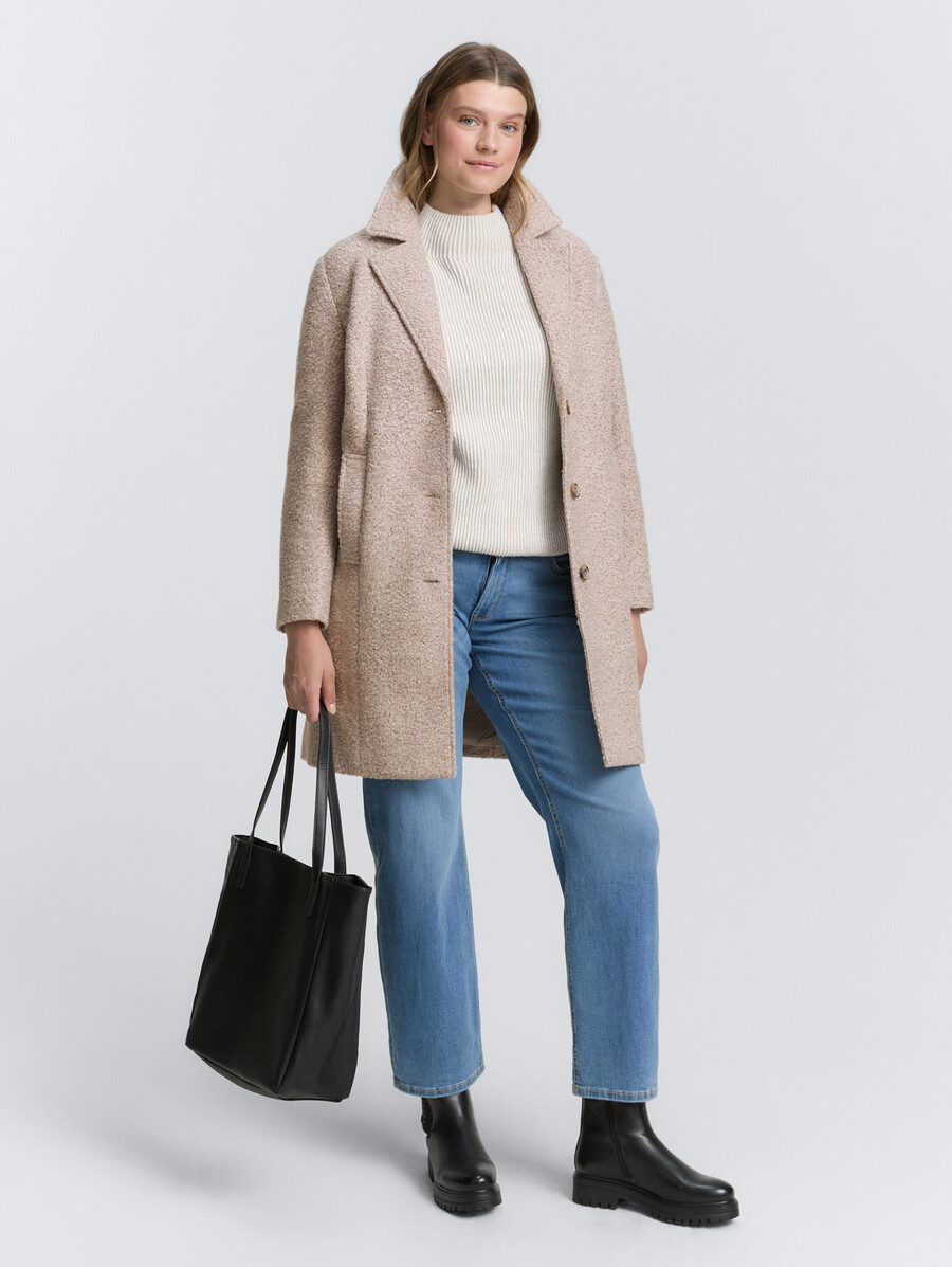manteau bouclé grande taille à col à revers
