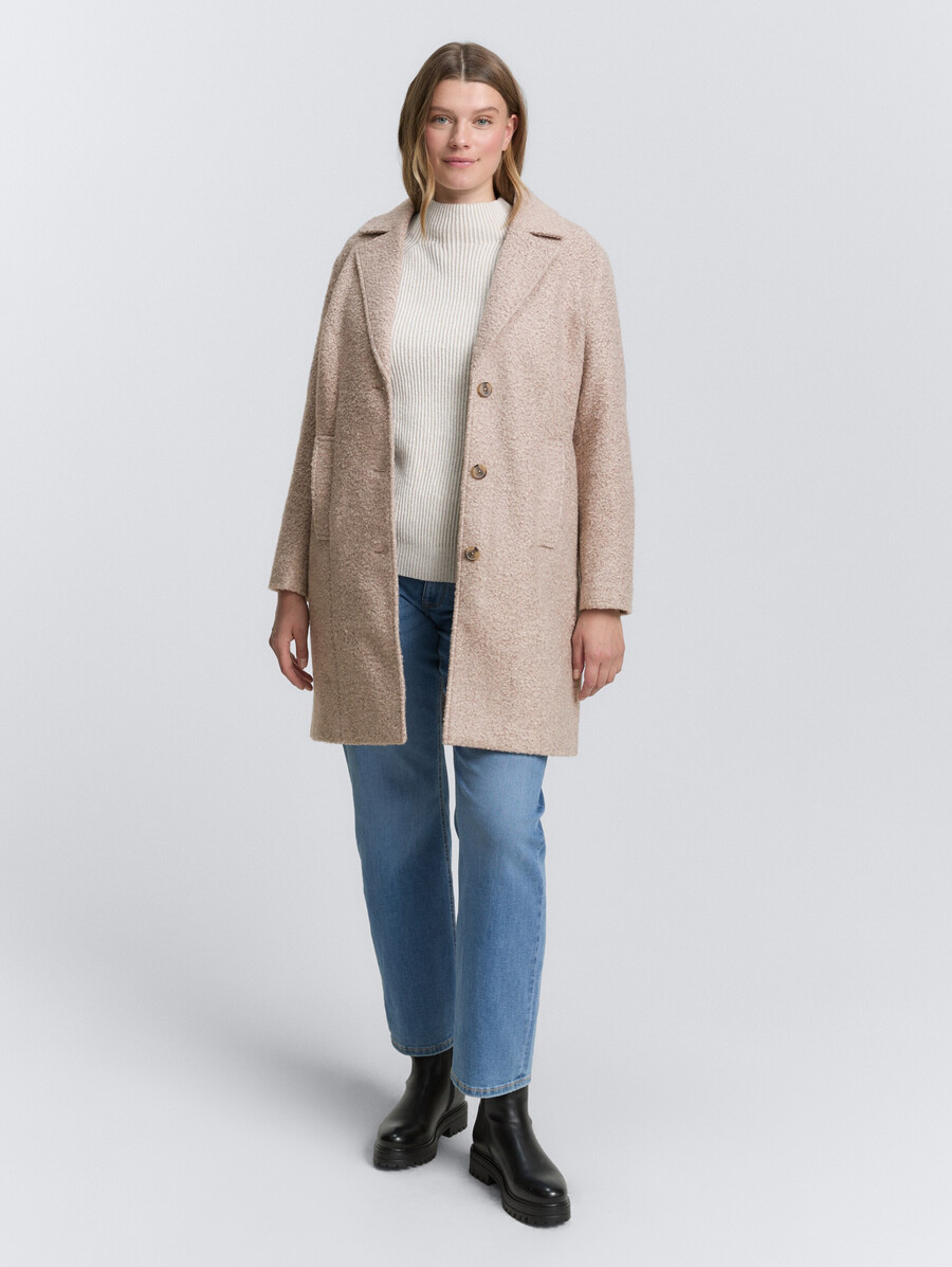 manteau bouclé grande taille à col à revers