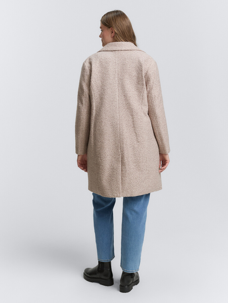 manteau bouclé grande taille à col à revers