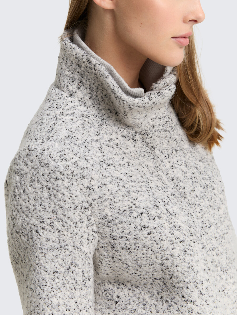 manteau en laine bouclée à col montant