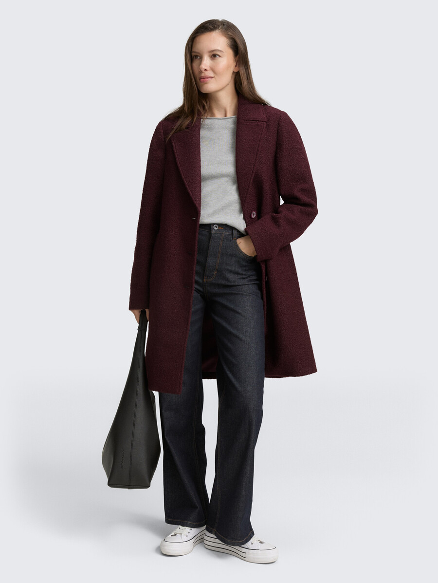 manteau bouclé avec col à revers