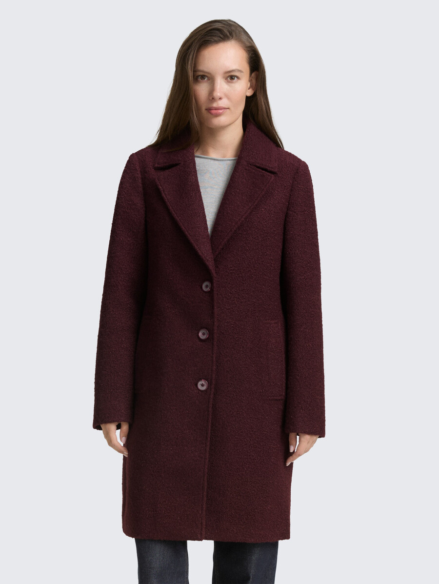 manteau bouclé avec col à revers