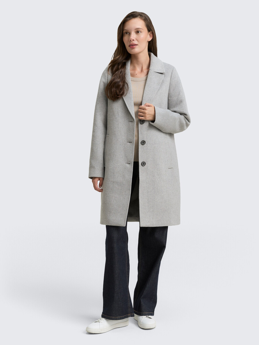manteau en laine à poches fendues