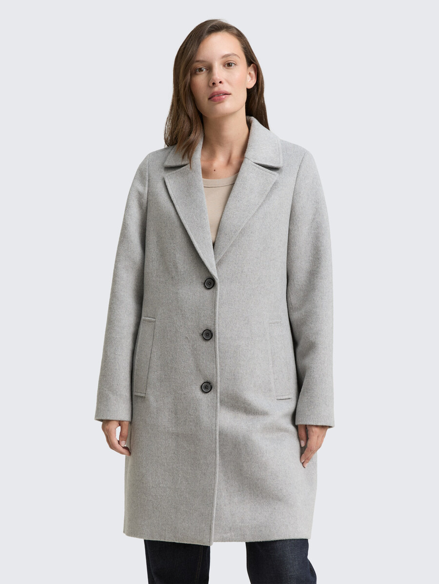 manteau en laine à poches fendues