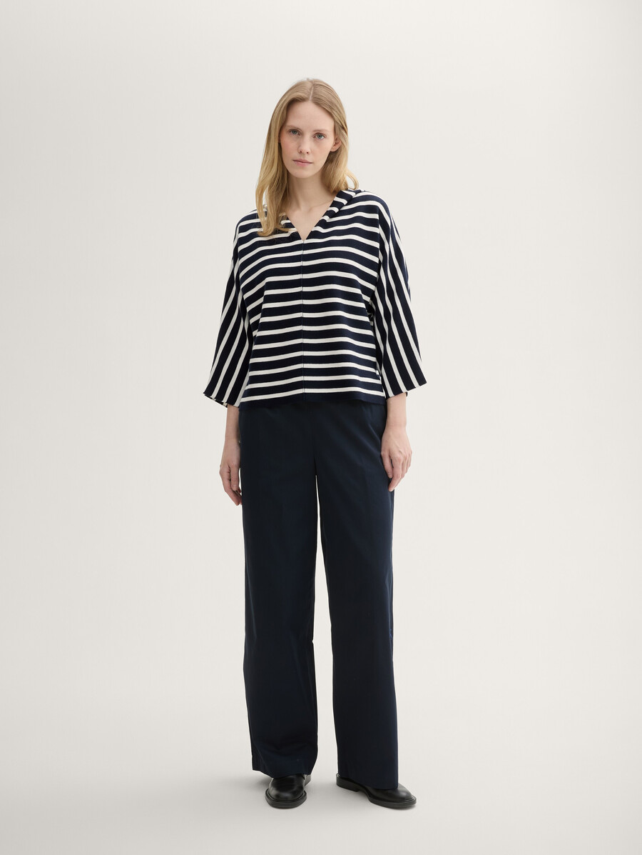 pull ample en maille à capuche