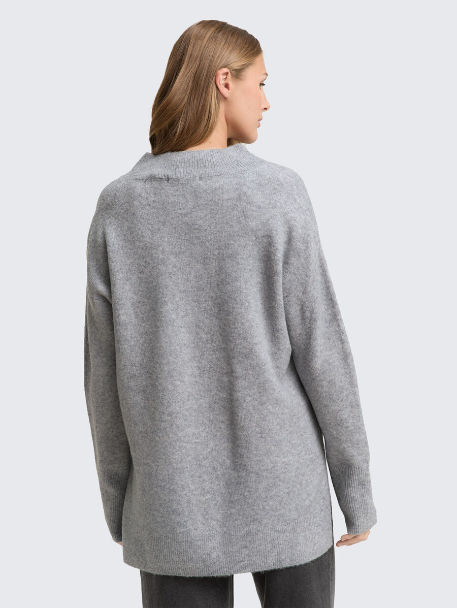 pull long en maille à col en v