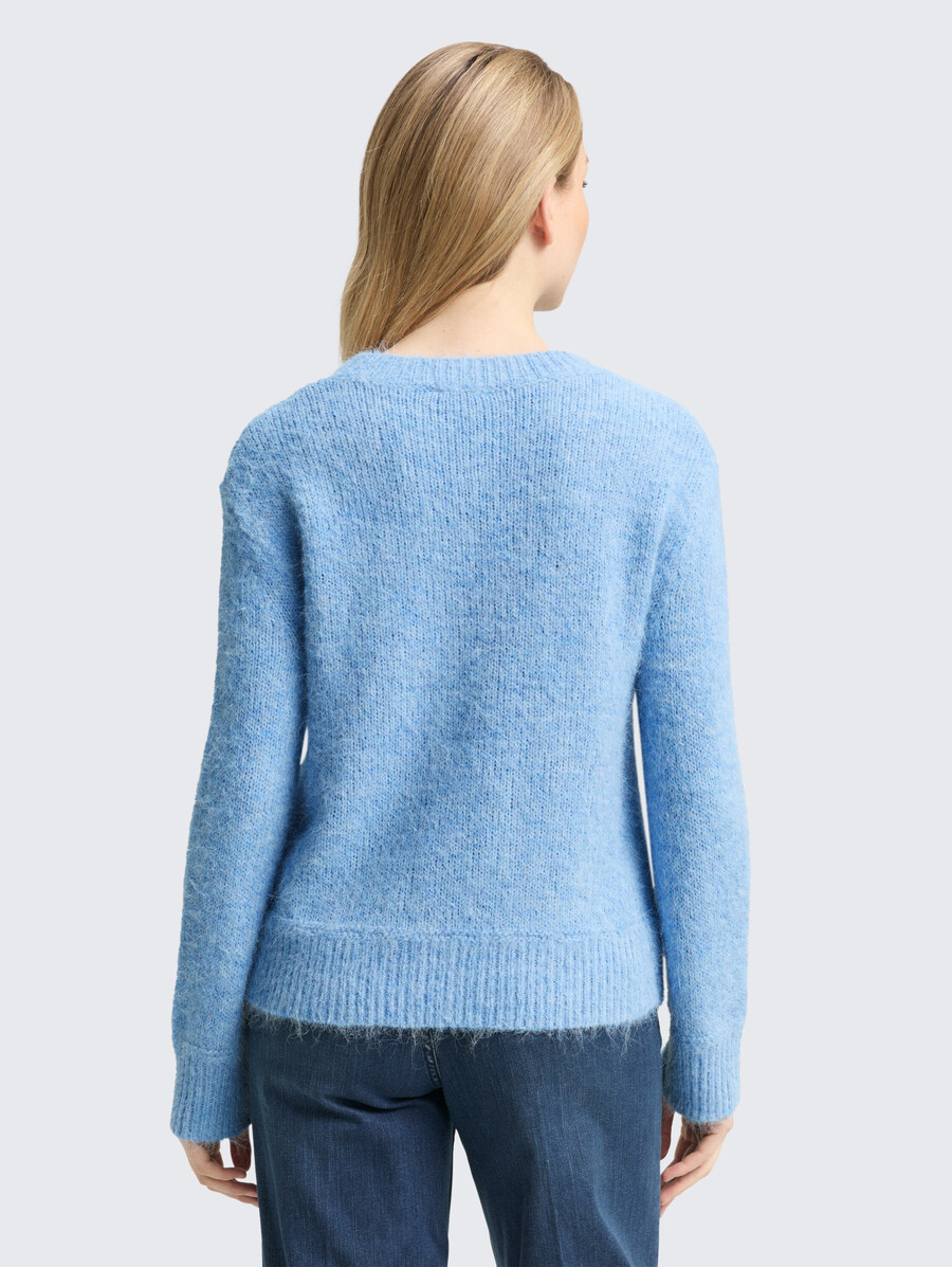 pull tricoté avec teneur en laine