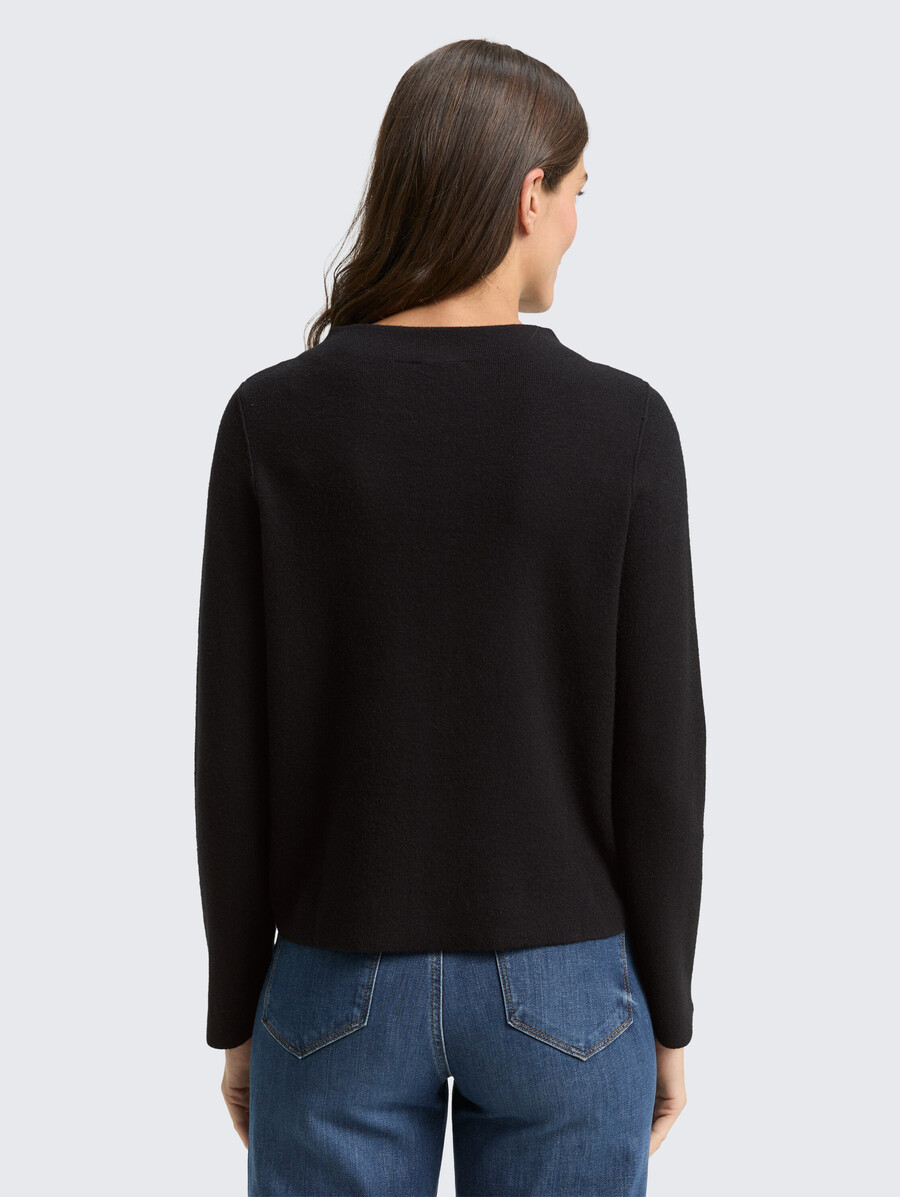 pull court en maille à col montant