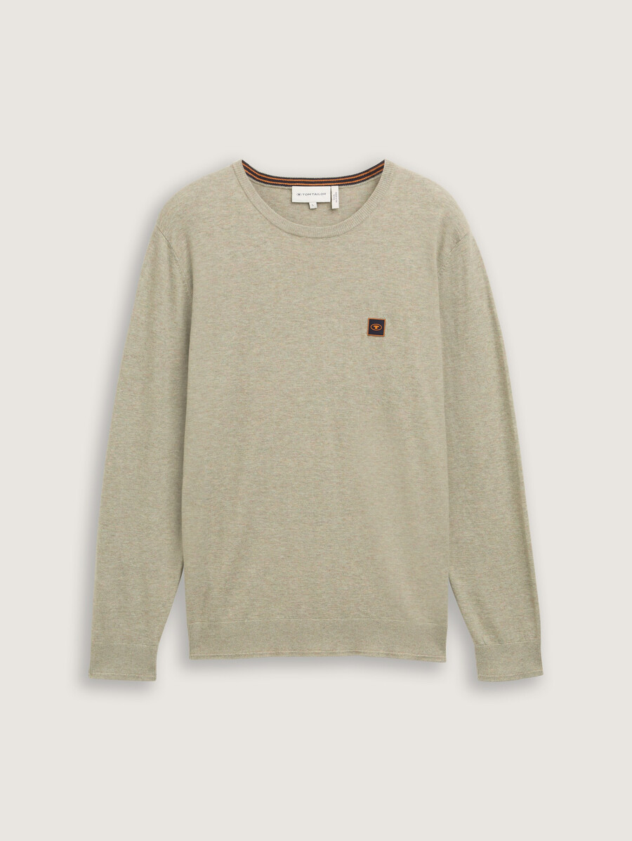 pull en maille avec badge logo