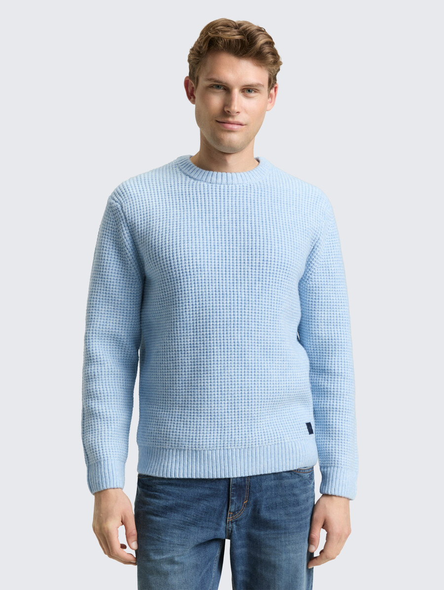 pull tricoté avec teneur en laine