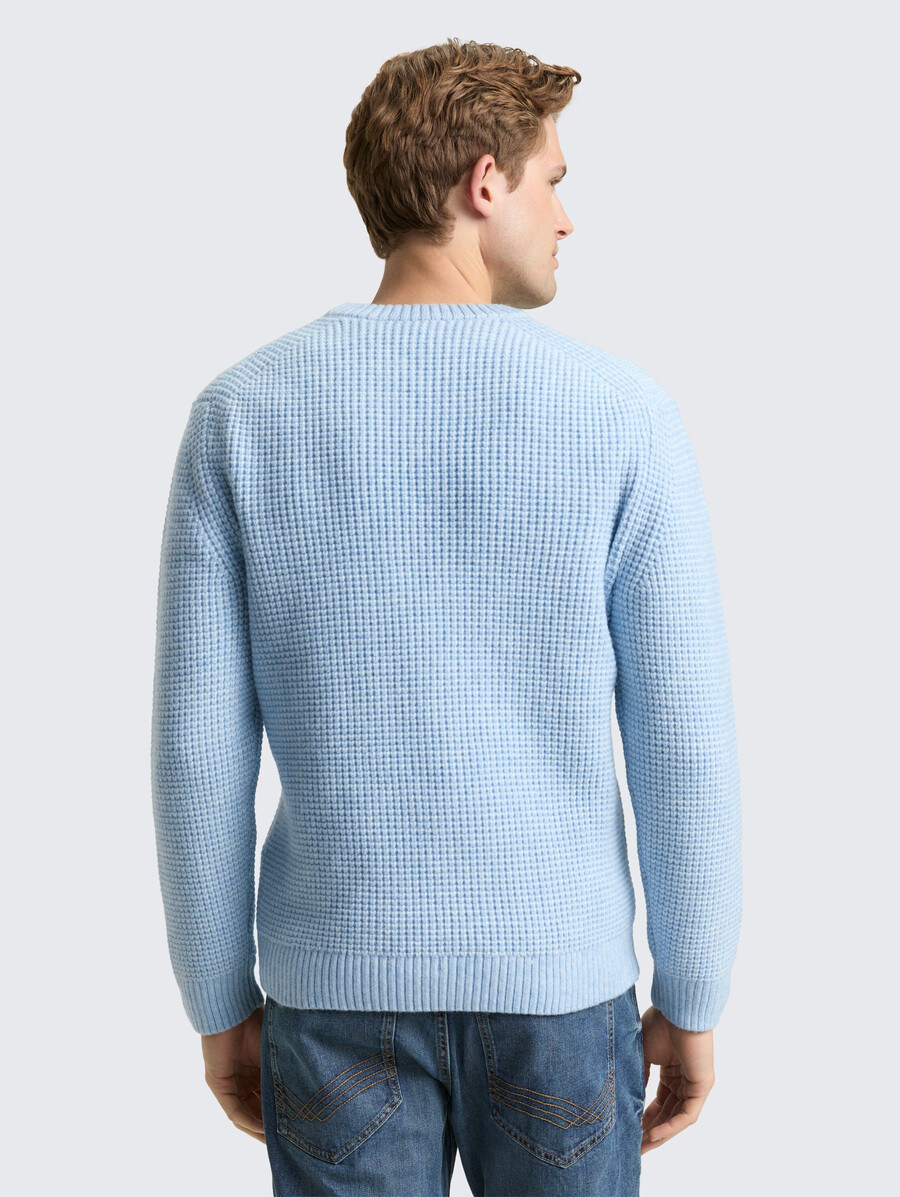 pull tricoté avec teneur en laine
