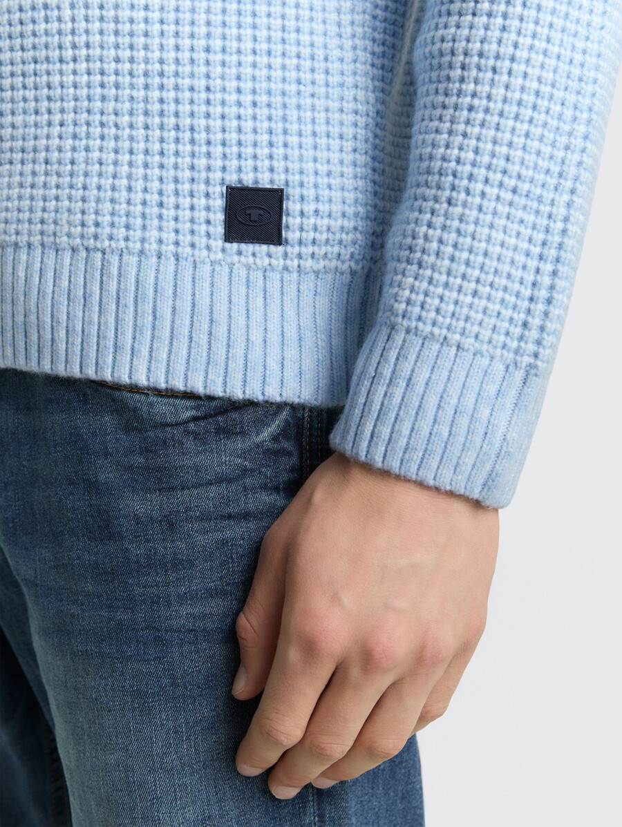 pull tricoté avec teneur en laine