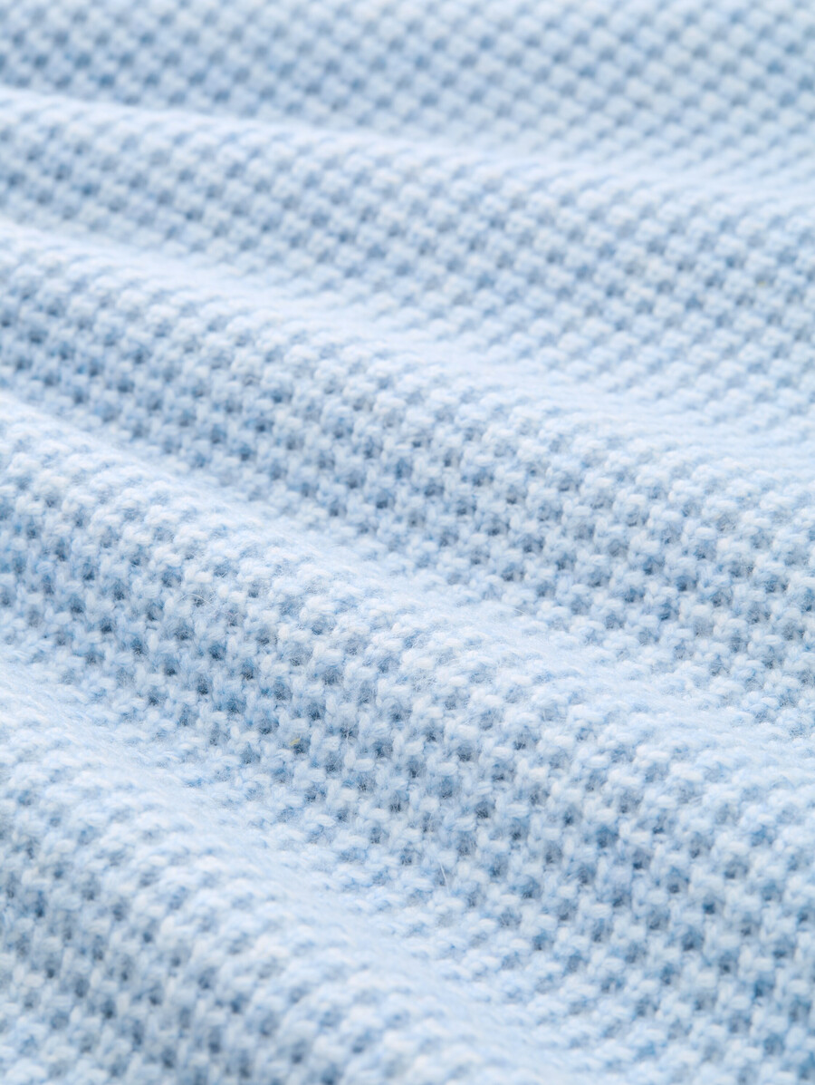 pull tricoté avec teneur en laine