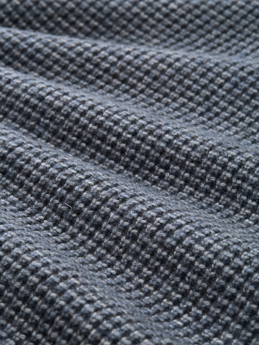 pull tricoté avec teneur en laine