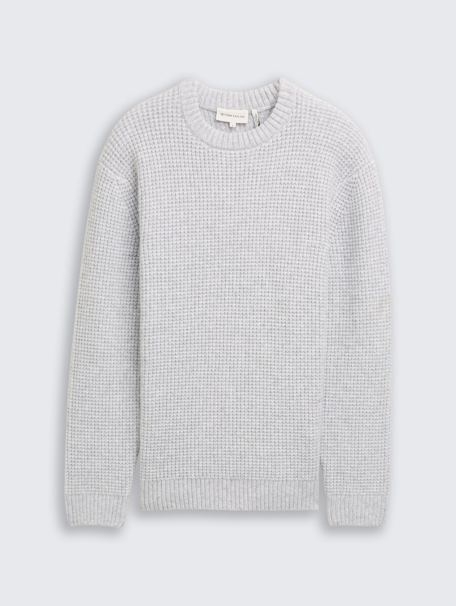 pull tricoté avec teneur en laine