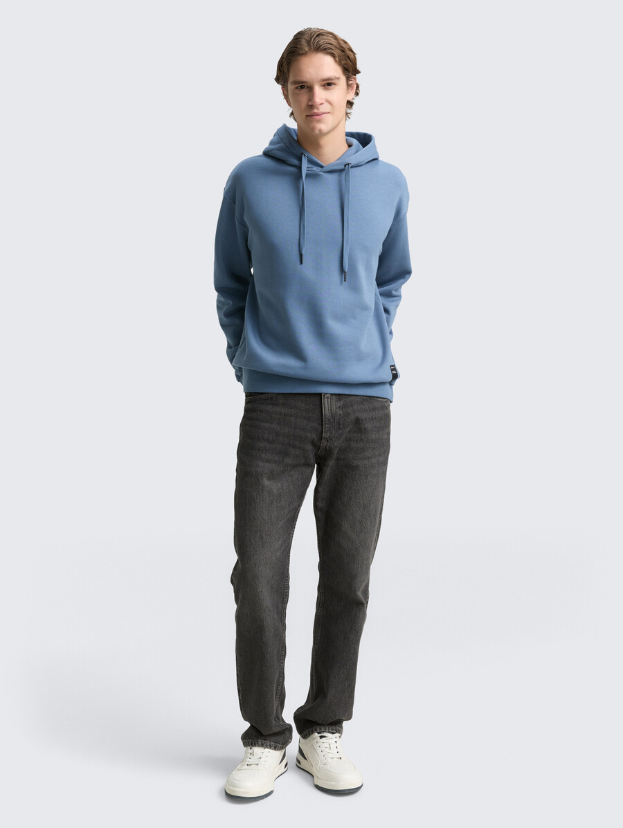 sweat à capuche avec badge logo