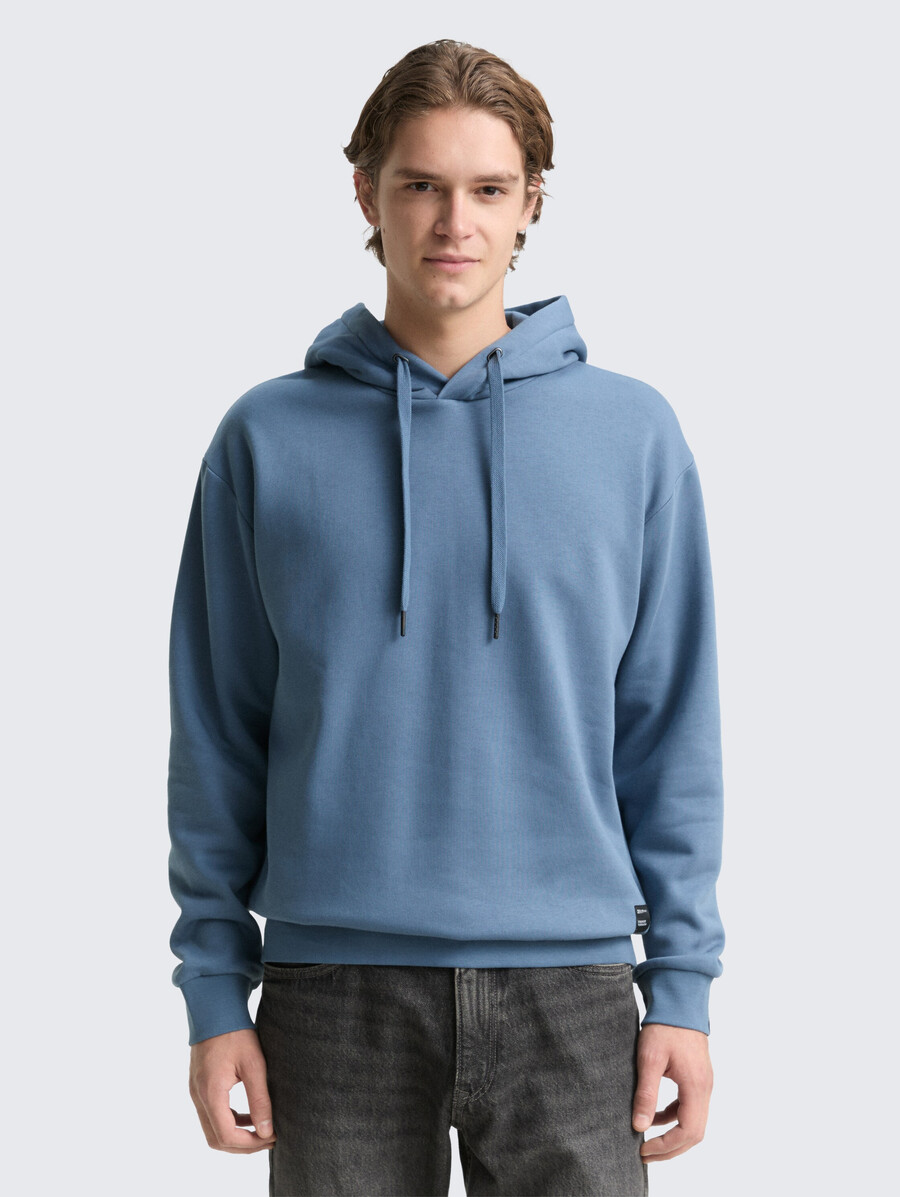 sweat à capuche avec badge logo