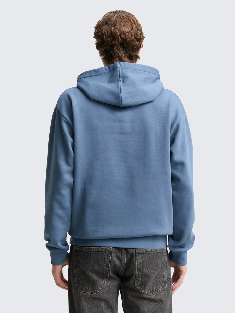 sweat à capuche avec badge logo