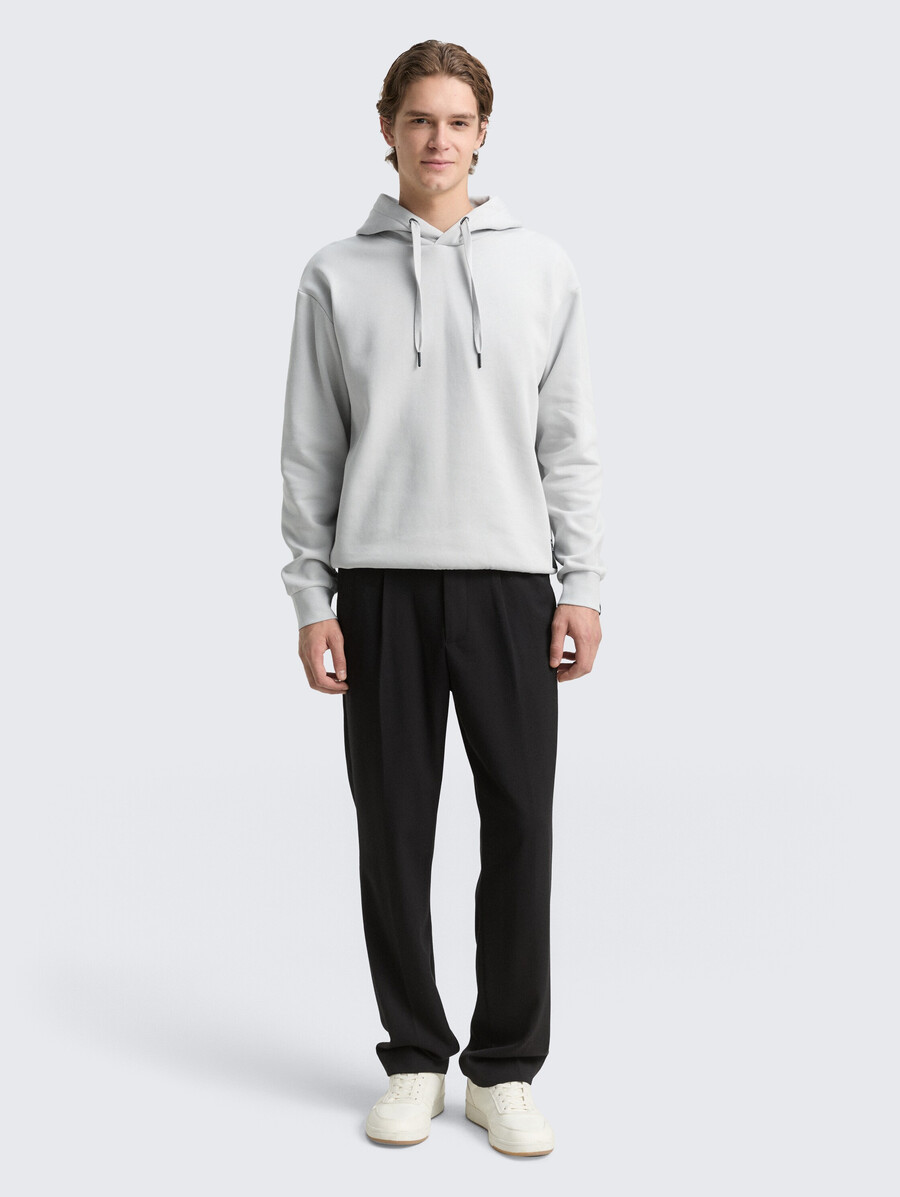 sweat à capuche avec badge logo