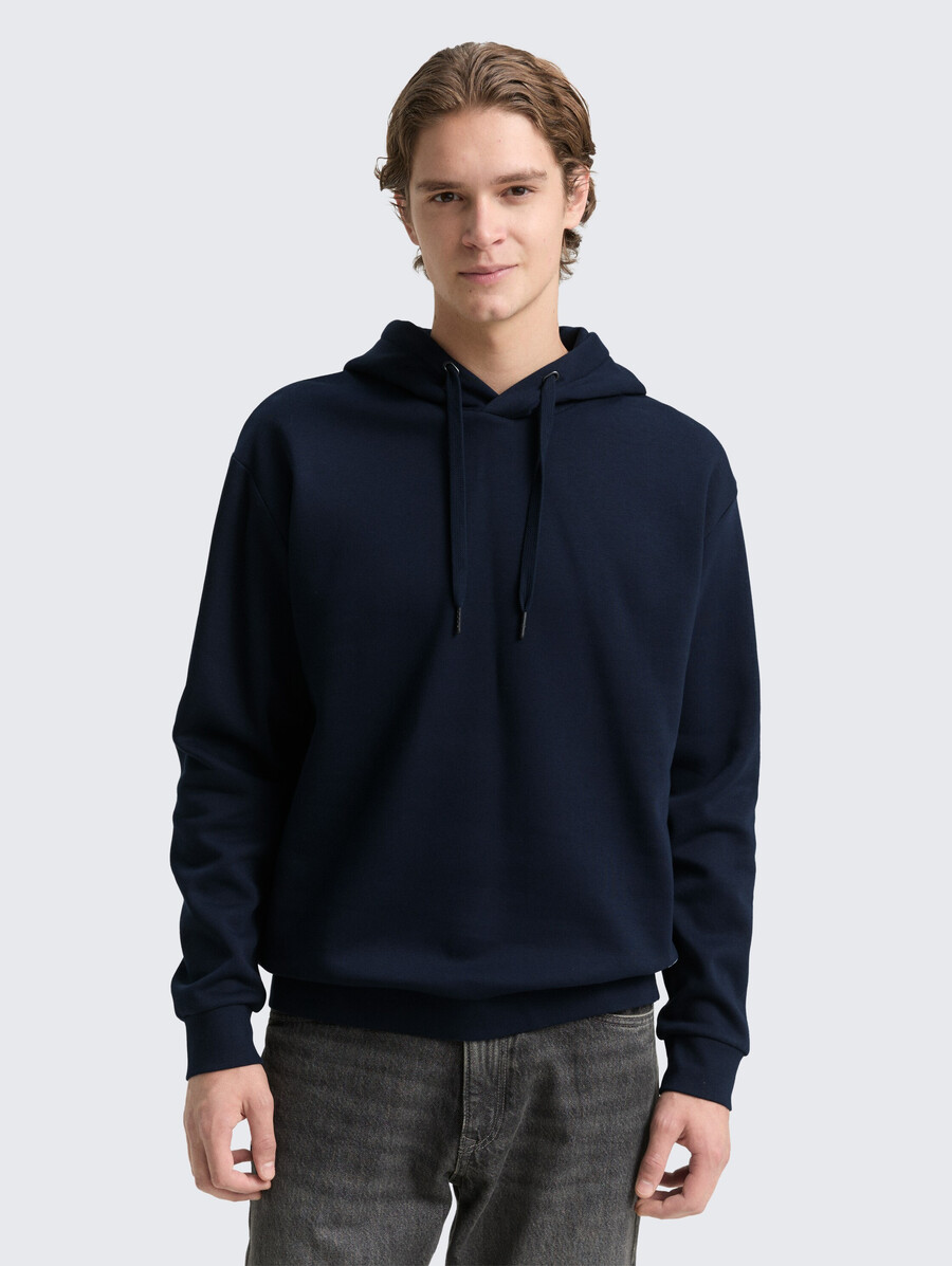 sweat à capuche avec badge logo