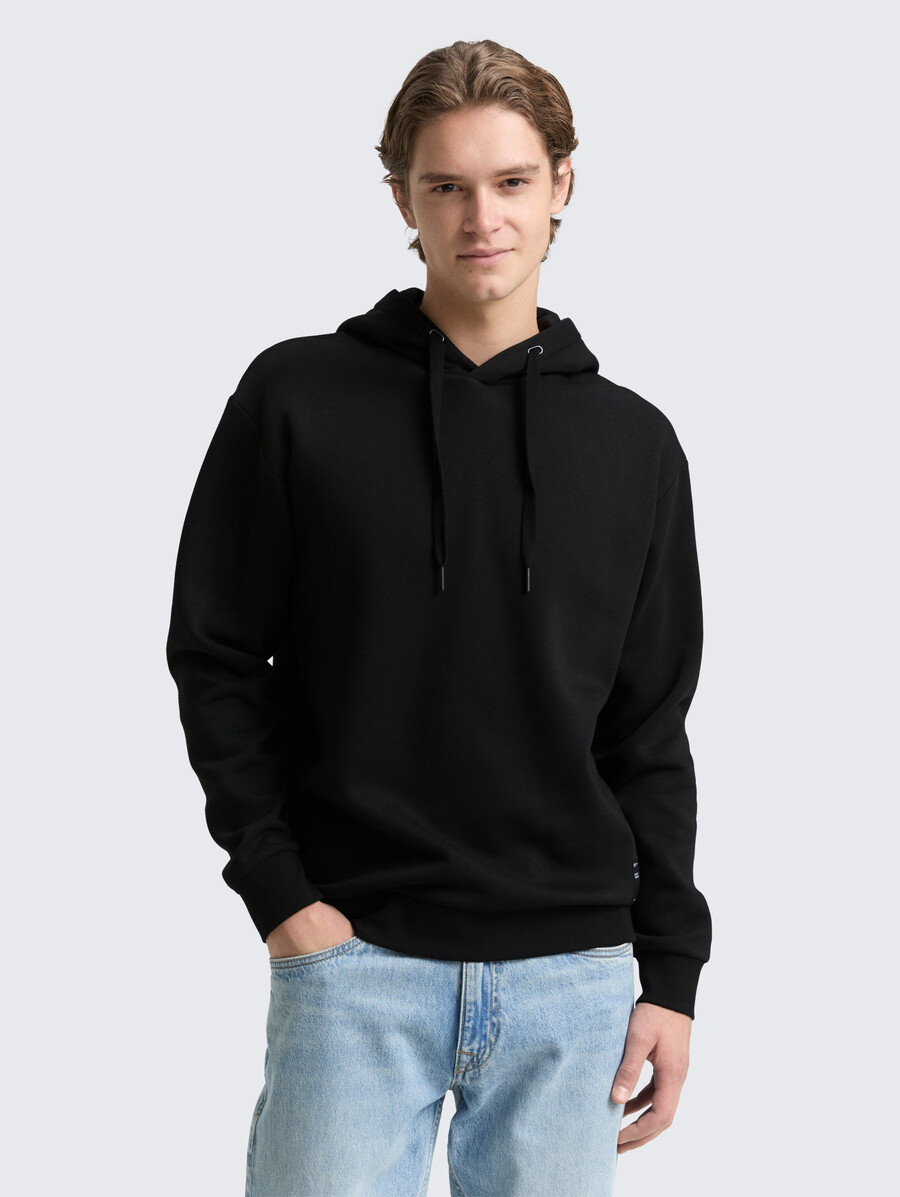 sweat à capuche avec badge logo