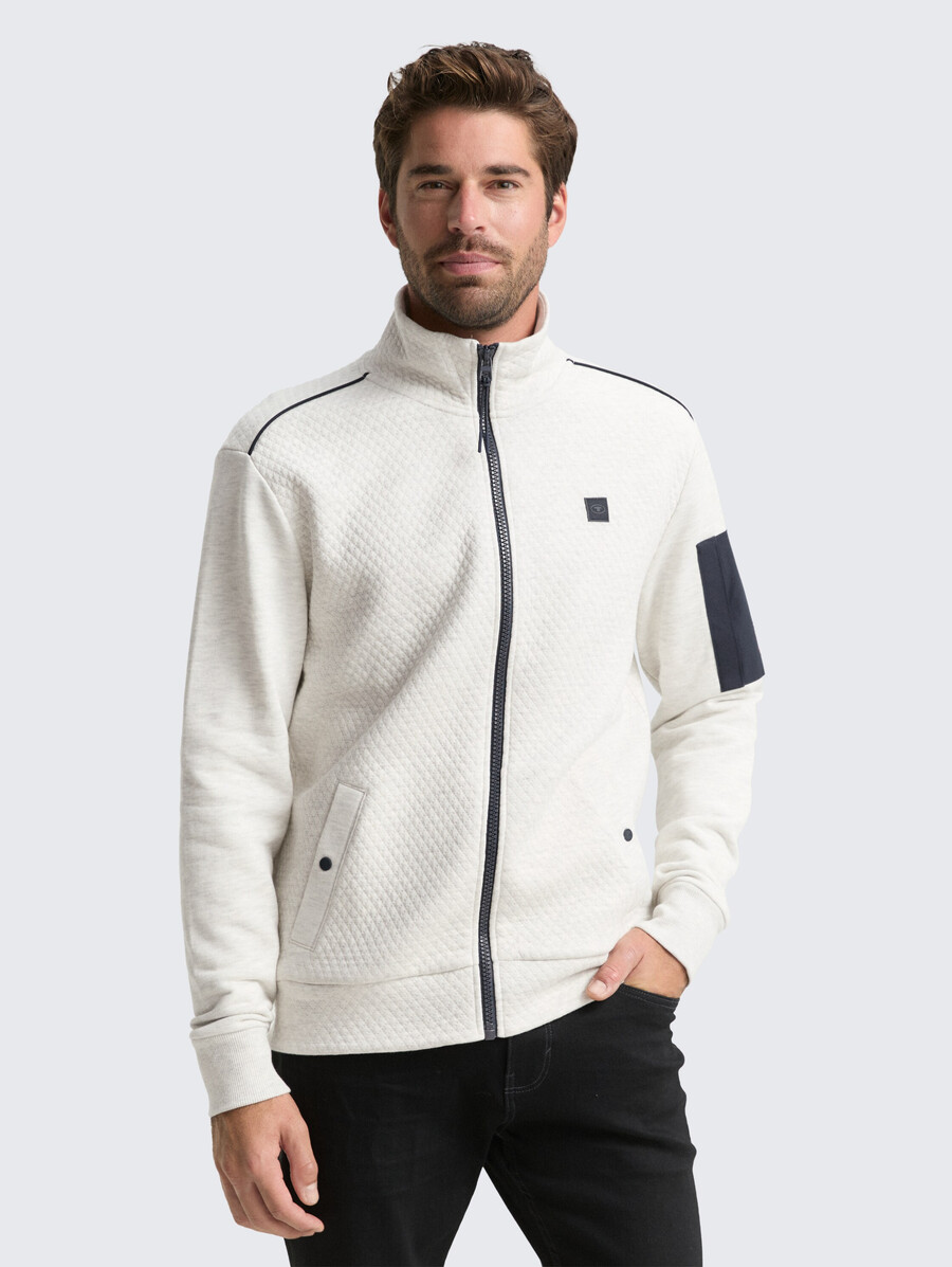 veste de survêtement avec poche sur la manche