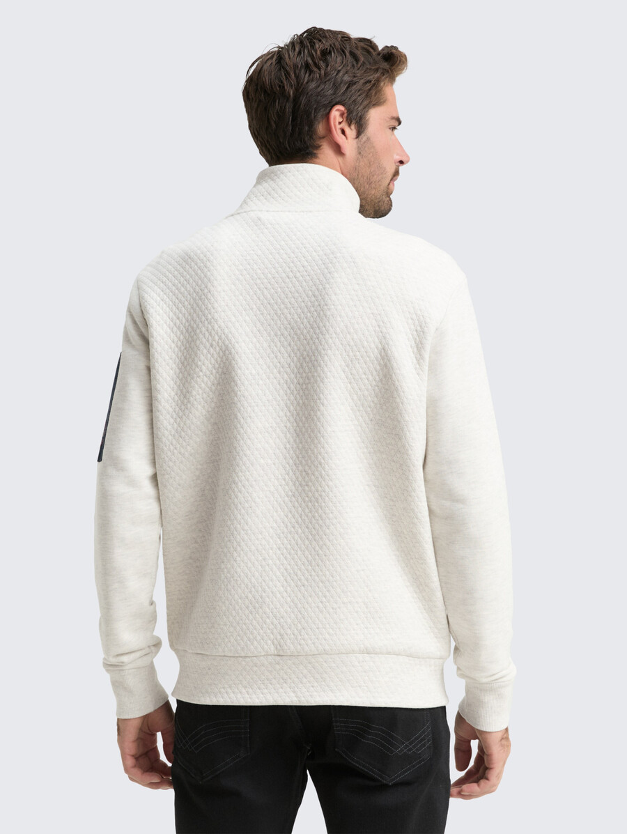 veste de survêtement avec poche sur la manche
