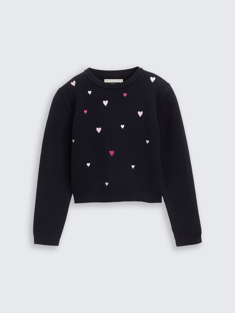 pull court en maille brodée