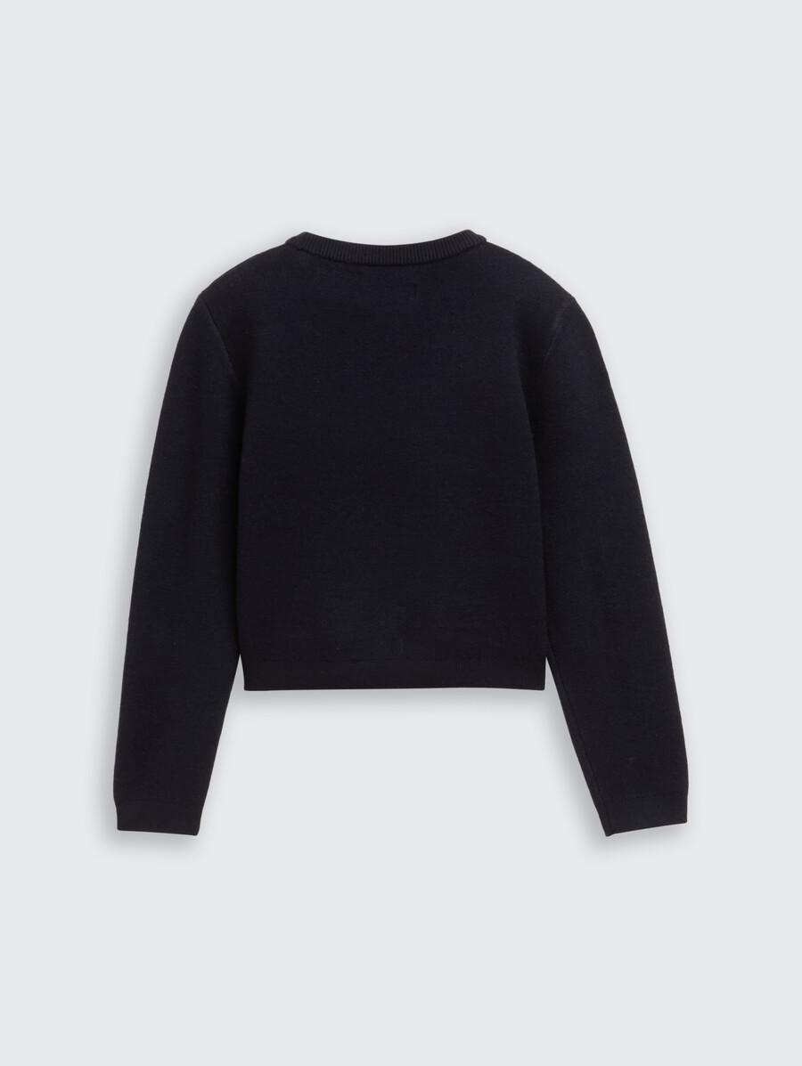 pull court en maille brodée