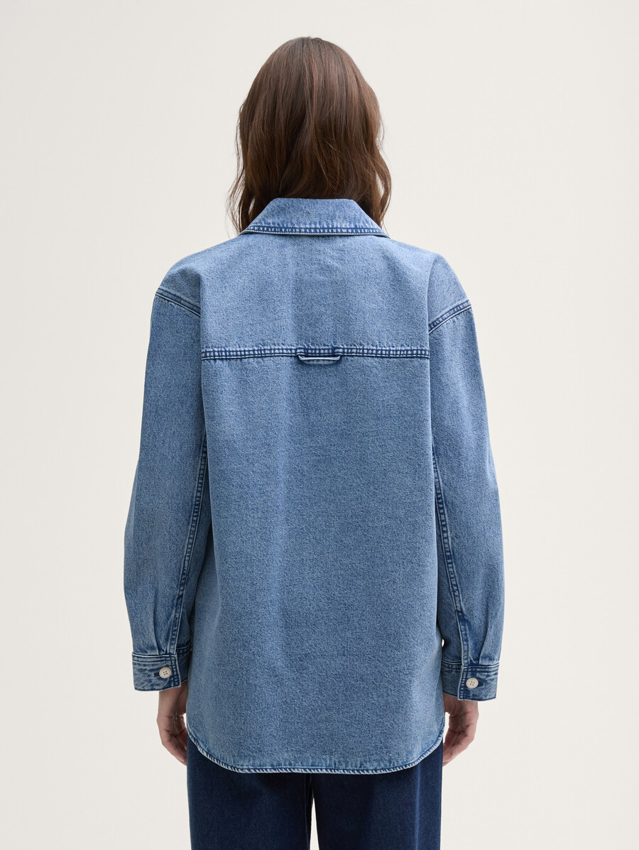 veste en jean à poches fendues