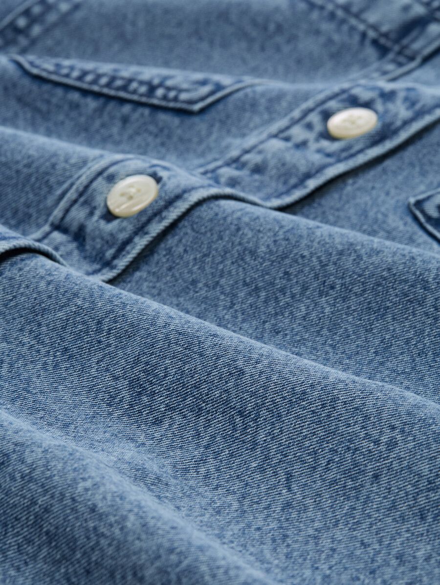 veste en jean à poches fendues