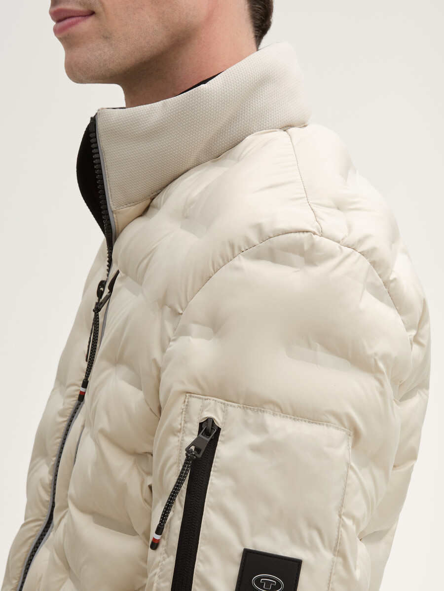 veste matelassée hybride légère à capuche et col montant