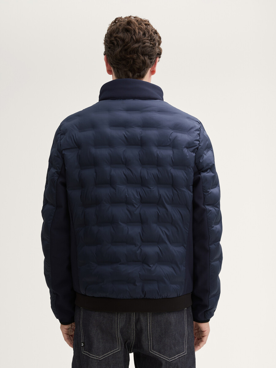 veste matelassée hybride légère à capuche et col montant