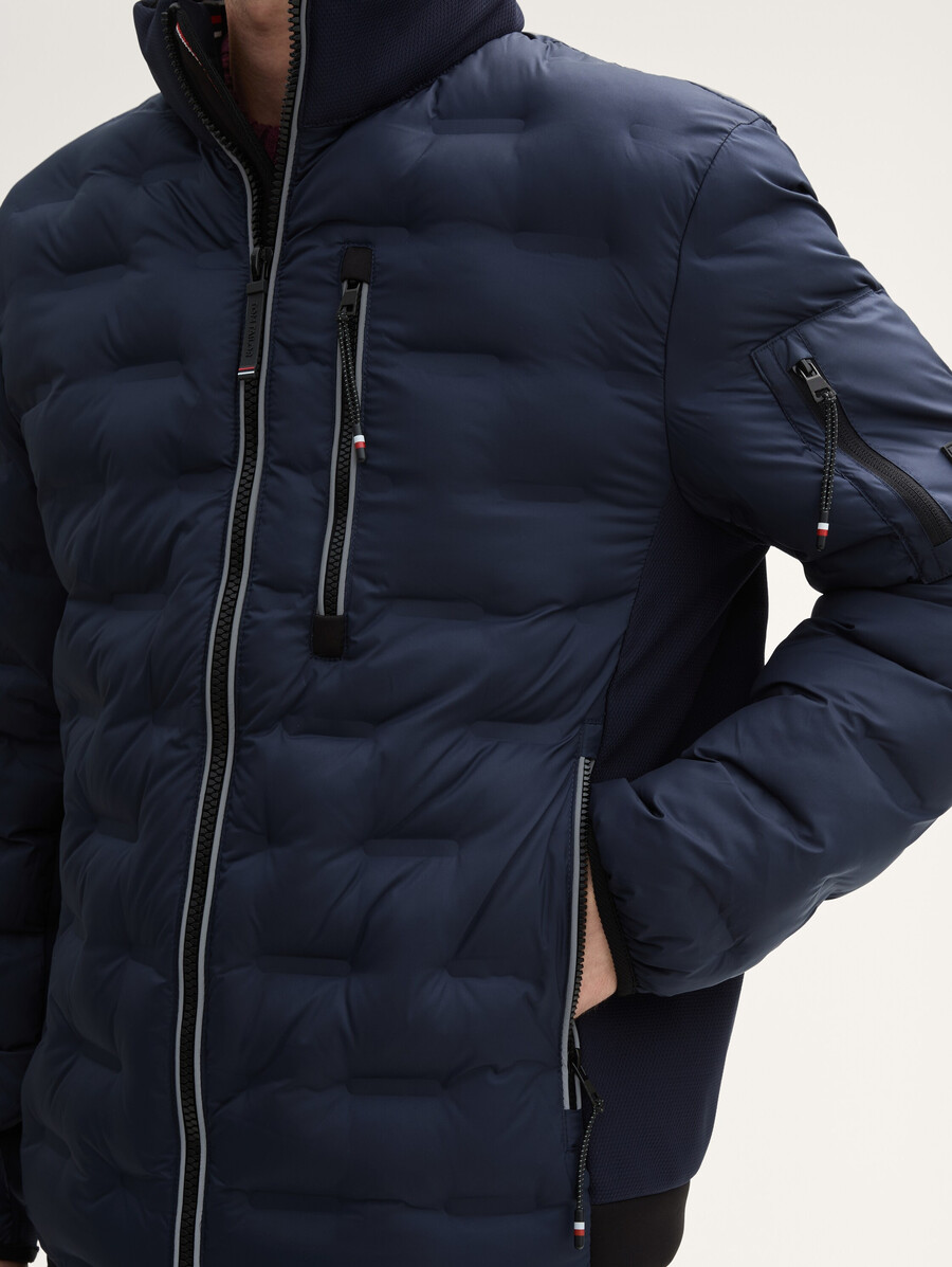 veste matelassée hybride légère à capuche et col montant