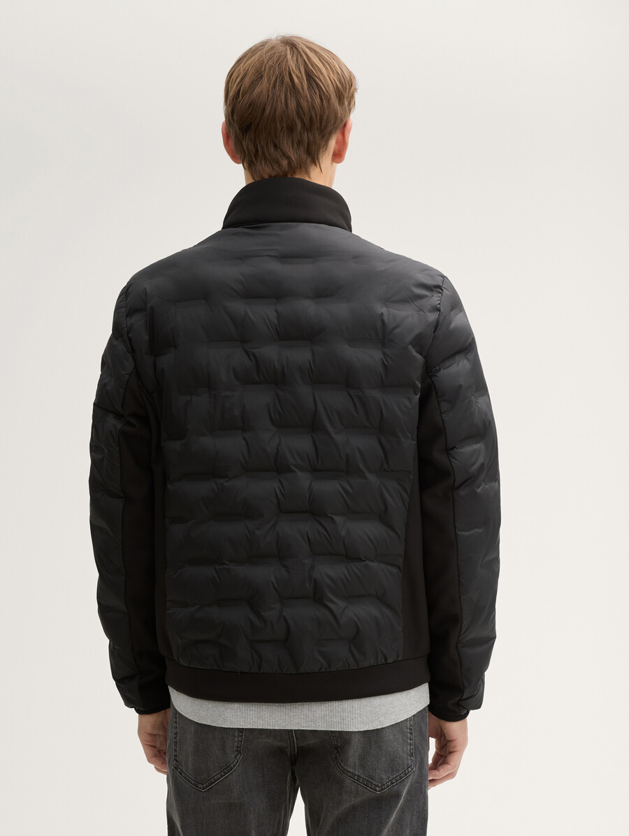 veste matelassée hybride légère à capuche et col montant