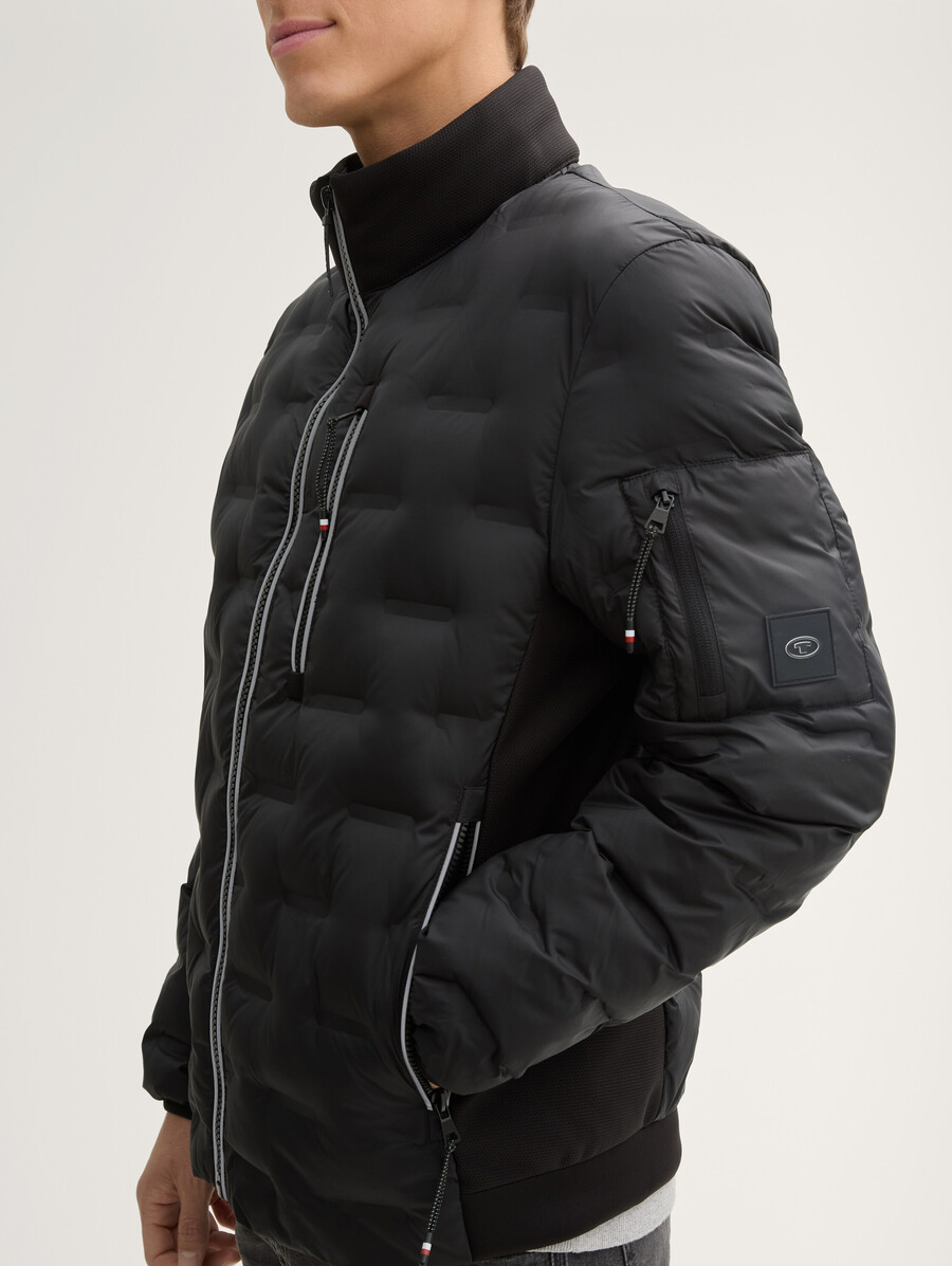 veste matelassée hybride légère à capuche et col montant
